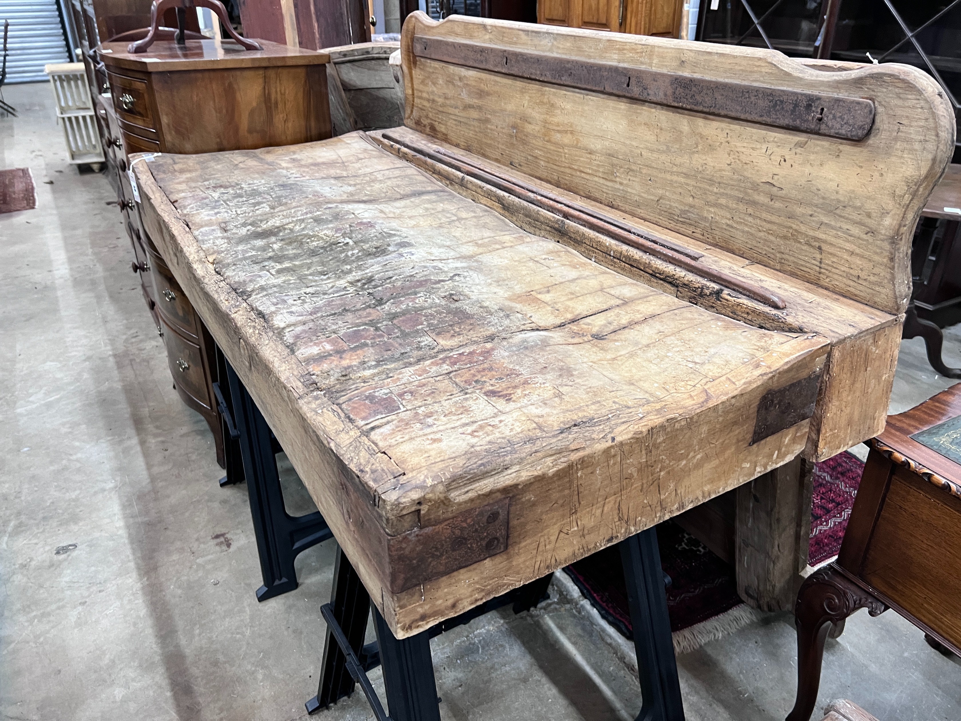 A Victorian butcher's block on modern trestle base, width 162cm, depth 76cm, height 126cm *Please note the sale commences at 9am.